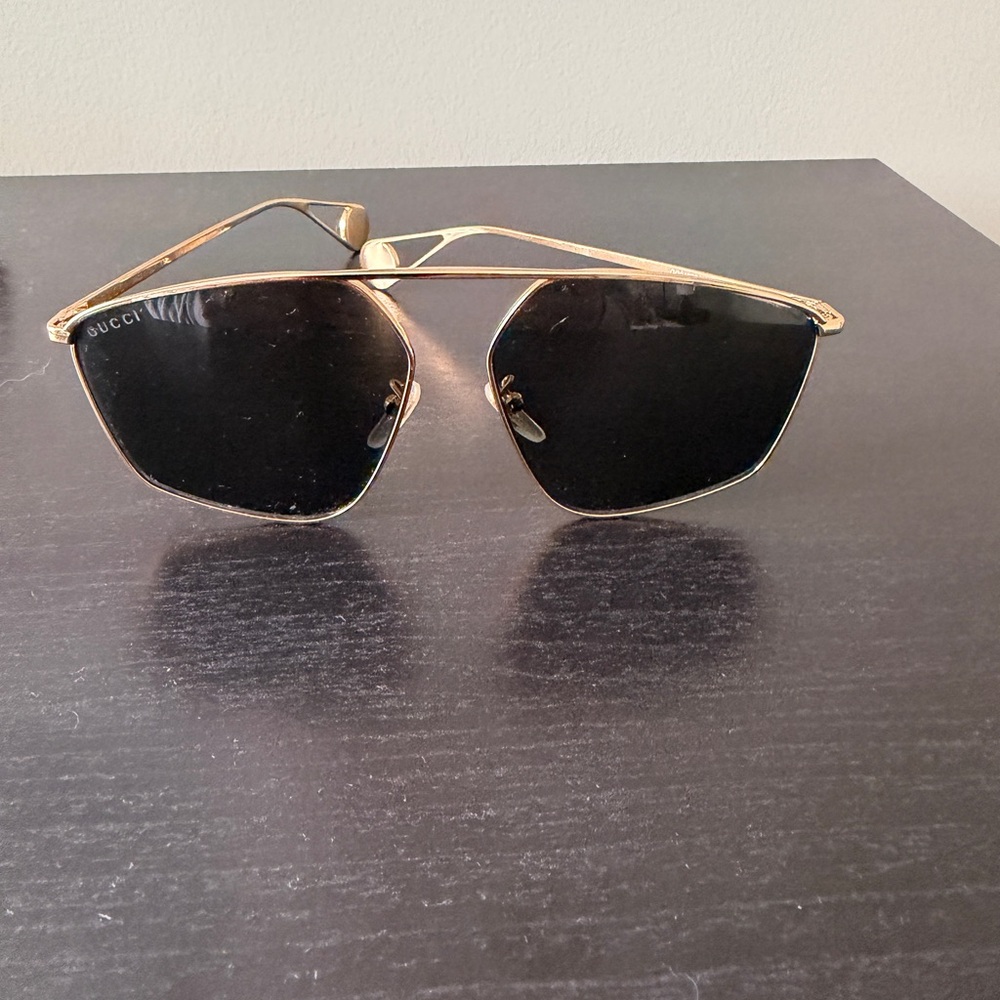Gucci Gold Frame Sunglasses with Black Accents